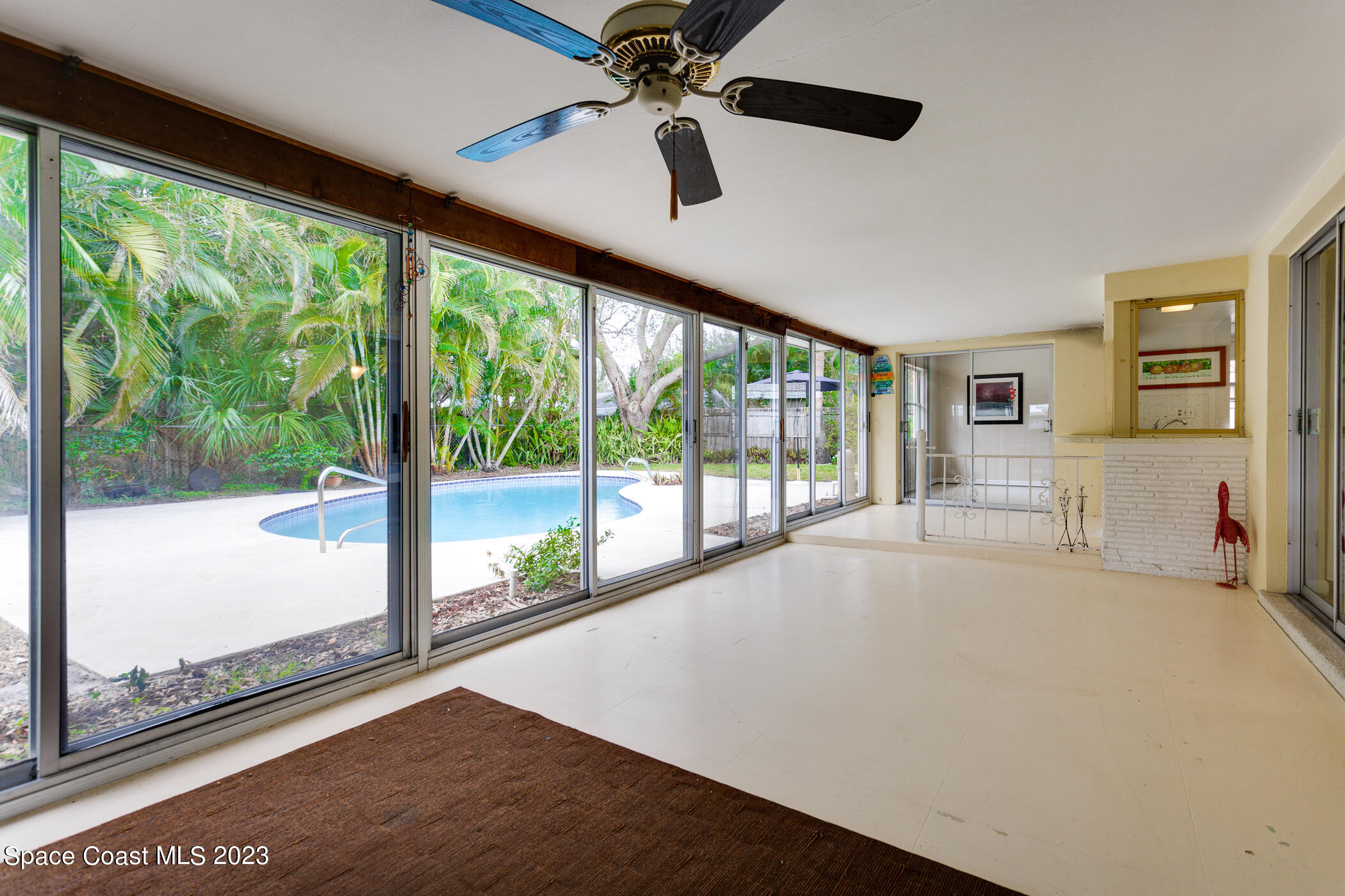608 Mango Drive Melbourne Beach, FL 32951 - Photo 23 of 30 a room with pool table and windows