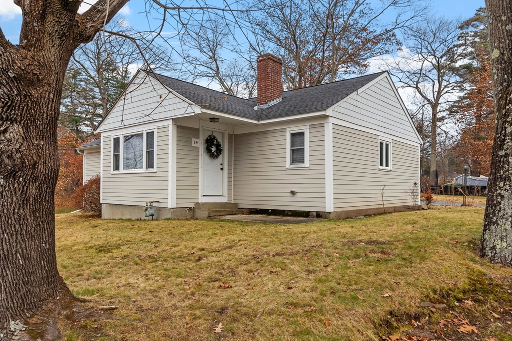 14 Curley Drive, Unit 14 Hudson, MA 01749 - Photo 1 of 1 a view of a house with a yard