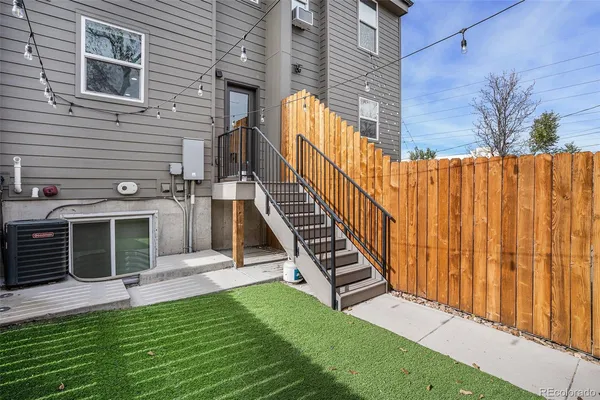 a view of a backyard with a small cabin