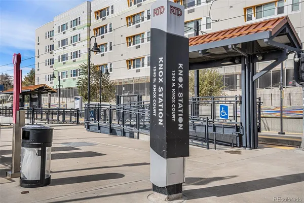 a view of street with tall buildings