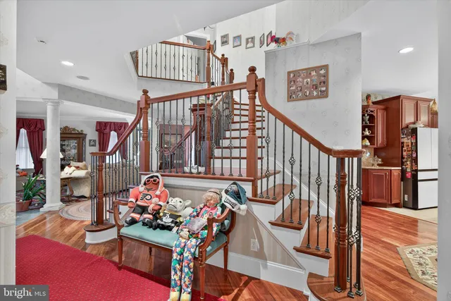 a bathroom with a sink toilet and a mirror