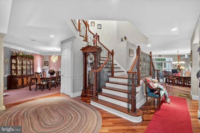 a living room with lots of furniture and a bed