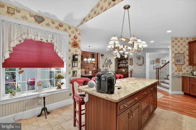 a media room with lots of chairs and a projector screen