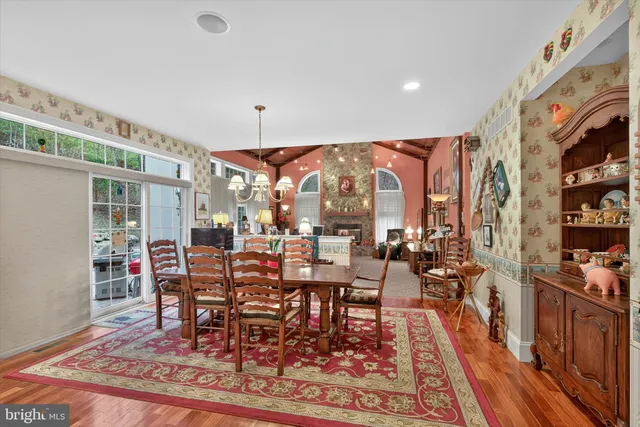 an aerial view of a house with a lake view