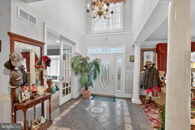 a living room with lots of furniture and gym equipment
