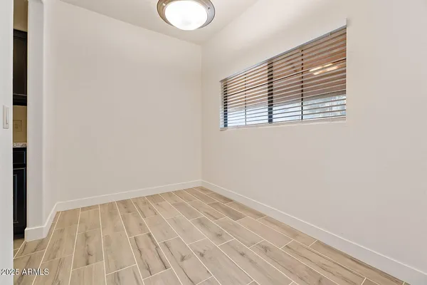 a view of a room that has a window in it