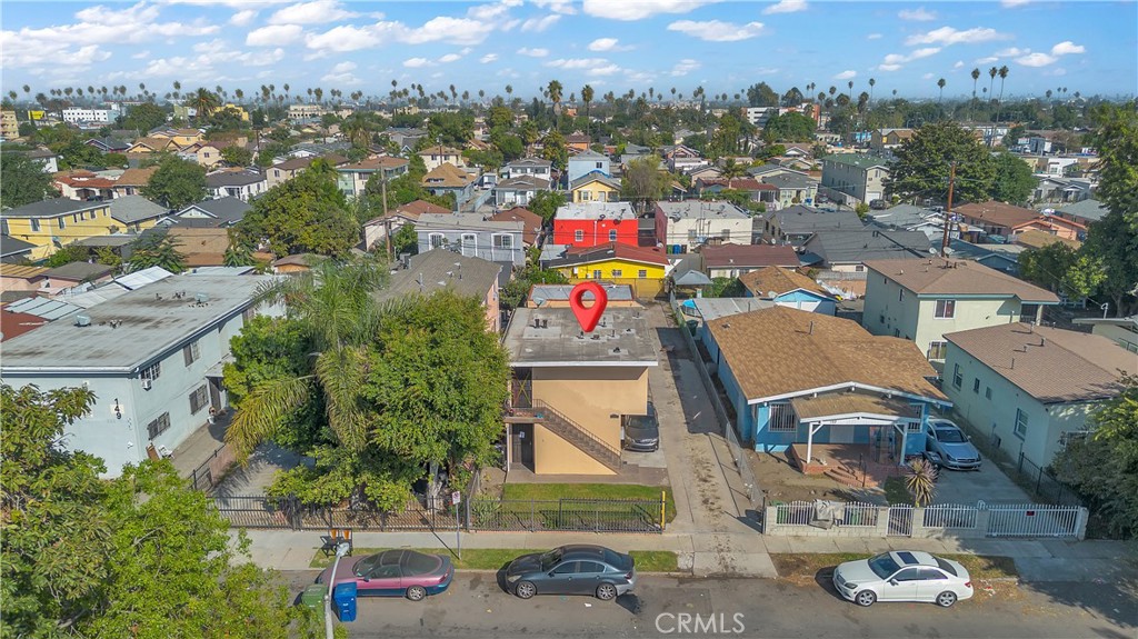 141 West 83rd Street Los Angeles, CA 90003 - Photo 3 of 22 an aerial view of a houses