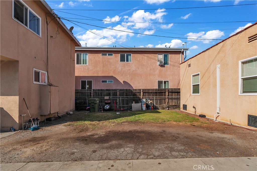 141 West 83rd Street Los Angeles, CA 90003 - Photo 6 of 22 a view of a house with a patio