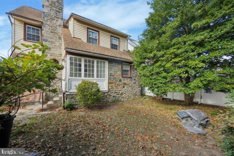 7011 Hazel Avenue Upper Darby, PA 19082 - Photo 13 of 16 front view of a house with a yard