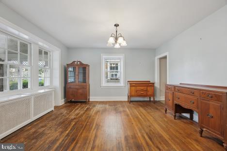 7011 Hazel Avenue Upper Darby, PA 19082 - Photo 5 of 16 a living room with furniture and a fireplace
