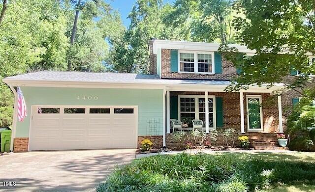 4400 Currie Court Raleigh, NC 27613 - Photo 1 of 35 front view of a house with a yard