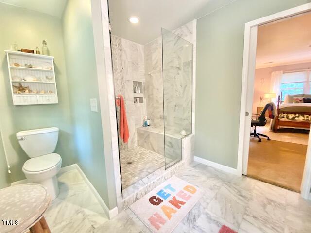 4400 Currie Court Raleigh, NC 27613 - Photo 21 of 35 a bathroom with a toilet sink and shower