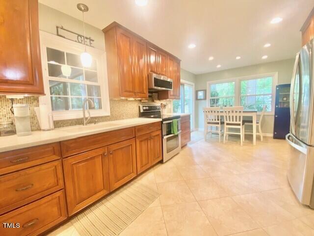 4400 Currie Court Raleigh, NC 27613 - Photo 4 of 35 a large kitchen with a large window and kitchen island