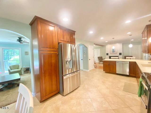 4400 Currie Court Raleigh, NC 27613 - Photo 7 of 35 a view of kitchen with refrigerator cabinets and open kitchen view