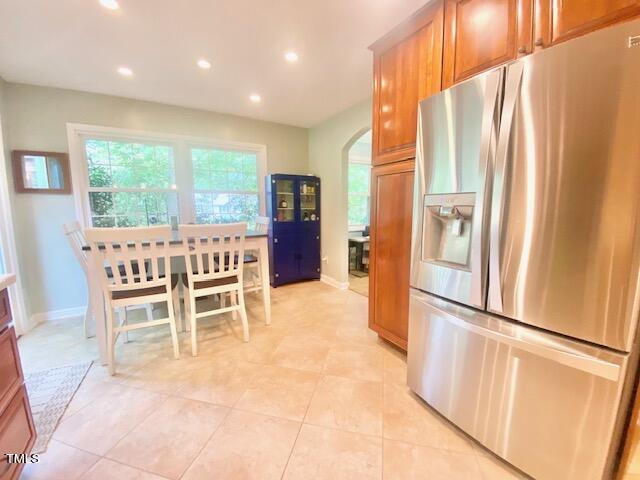 4400 Currie Court Raleigh, NC 27613 - Photo 9 of 35 a dining room with furniture and a window