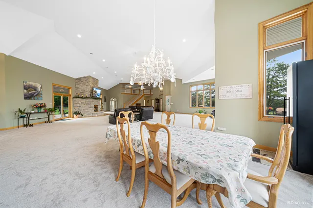 a dining room with a table and chairs