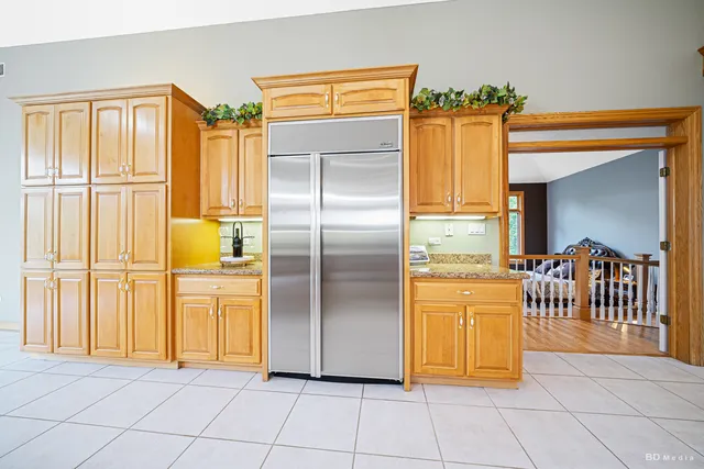 a bathroom with a mirror and a shower