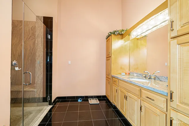 a view of a hallway and a livingroom with furniture