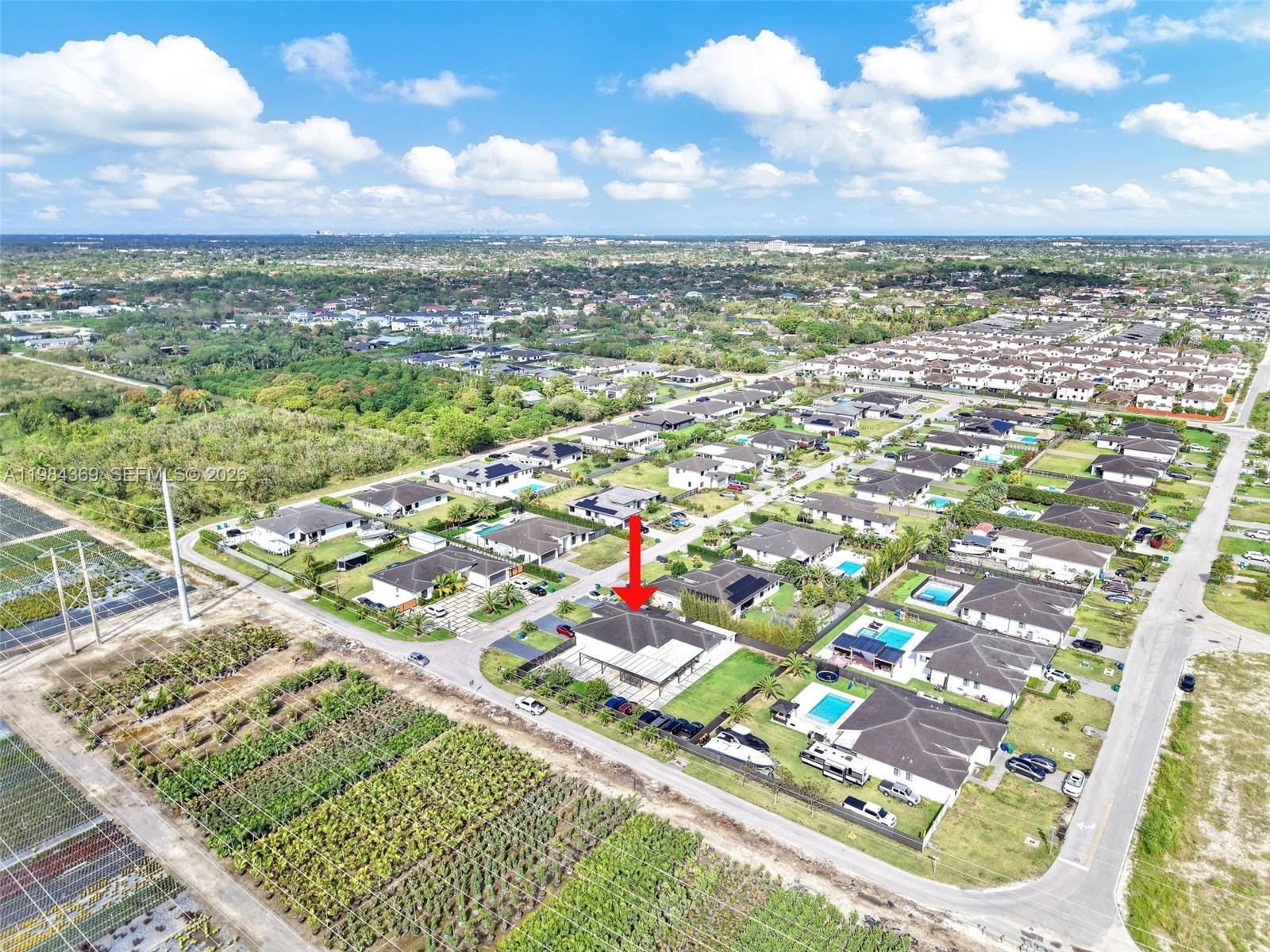 13334 Southwest 227th Street Miami, FL 33170 - Photo 13 of 69 a city view with tall buildings