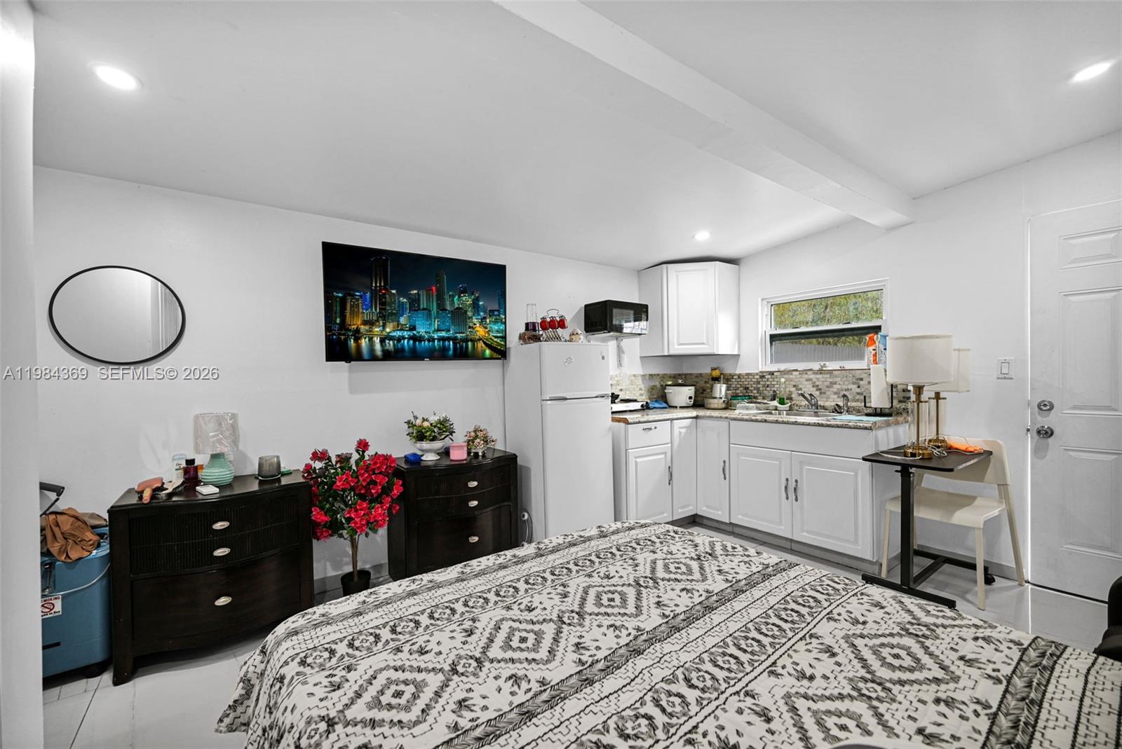 13334 Southwest 227th Street Miami, FL 33170 - Photo 47 of 69 a kitchen with a sink and cabinets