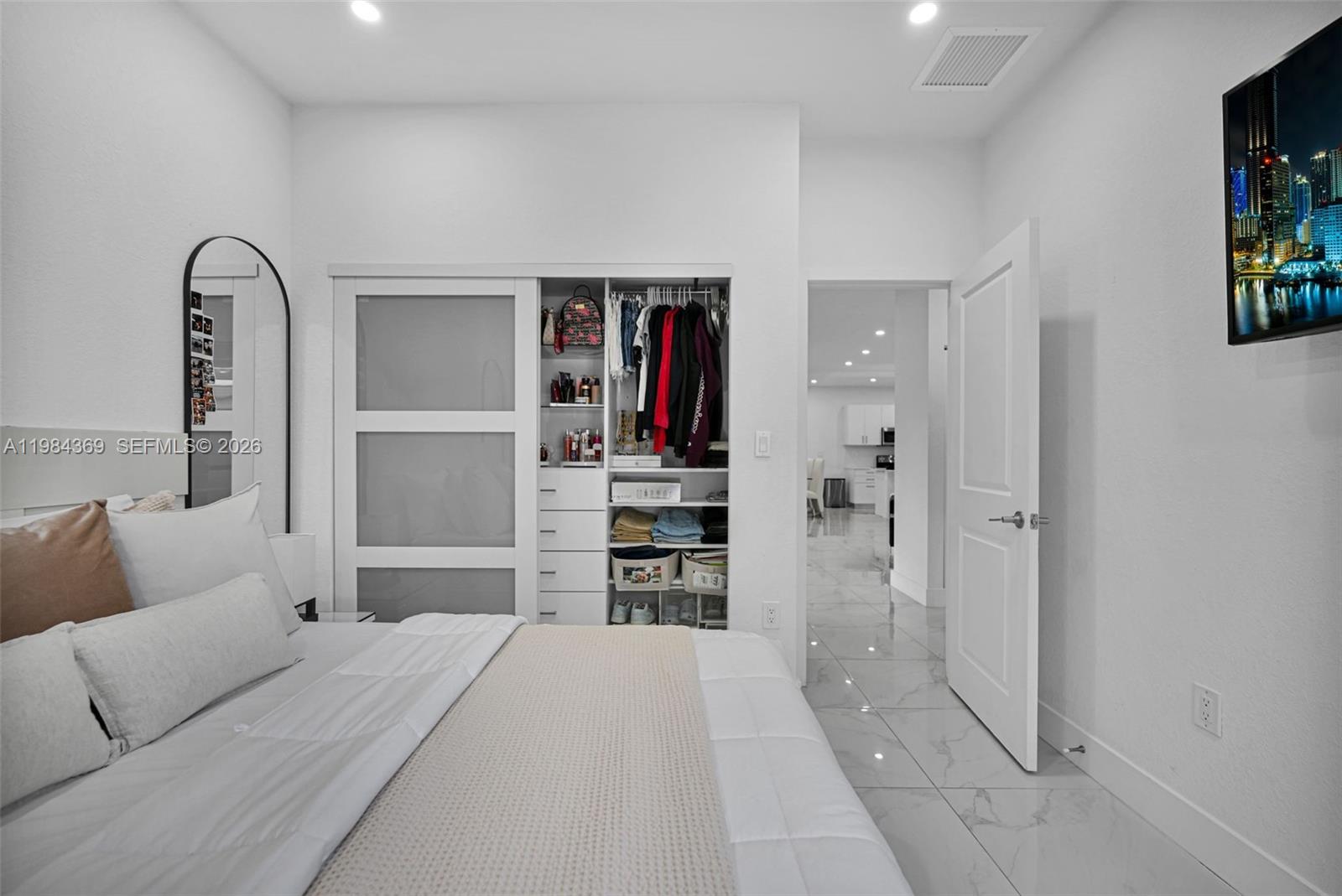 13334 Southwest 227th Street Miami, FL 33170 - Photo 68 of 69 a bedroom with a bed and a television