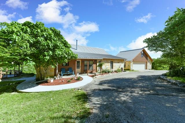 503 Deer Road Fredericksburg, TX 78624 - Photo 1 of 1 a view of a house with a yard and sitting area