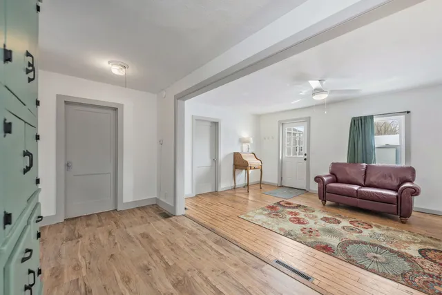 a bedroom with a bed and a couch