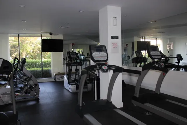a view of a room with gym equipment