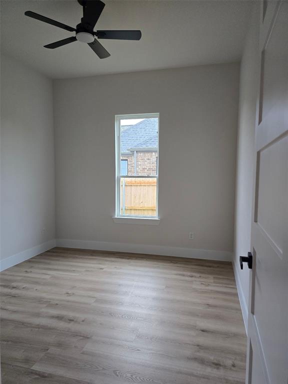 808 N Avenue East Springtown, TX 76082 - Photo 18 of 21 a view of an empty room with a window