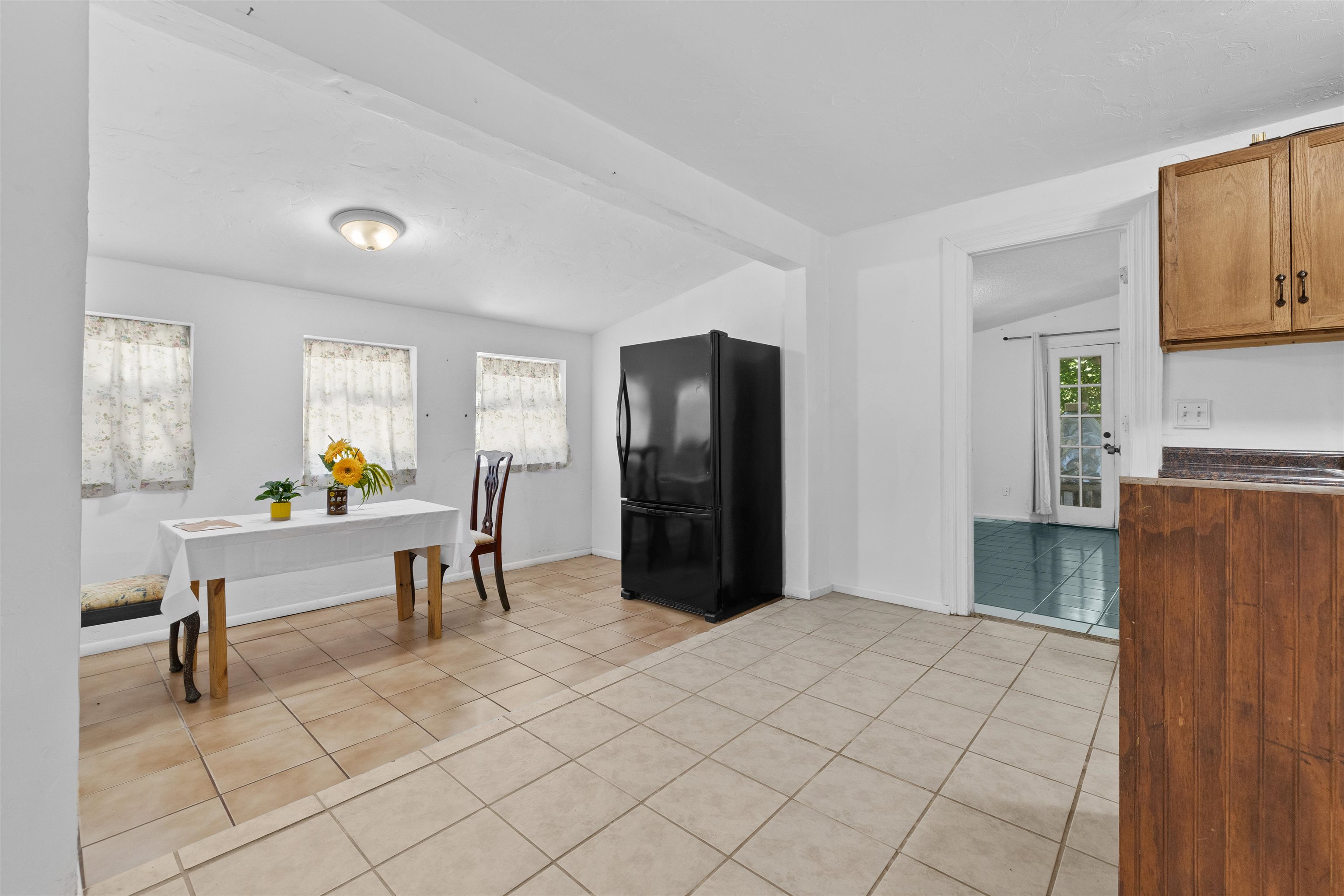 1463 Spring Street St. Augustine, FL 32084 - Photo 5 of 27 a living room with furniture and a dining table