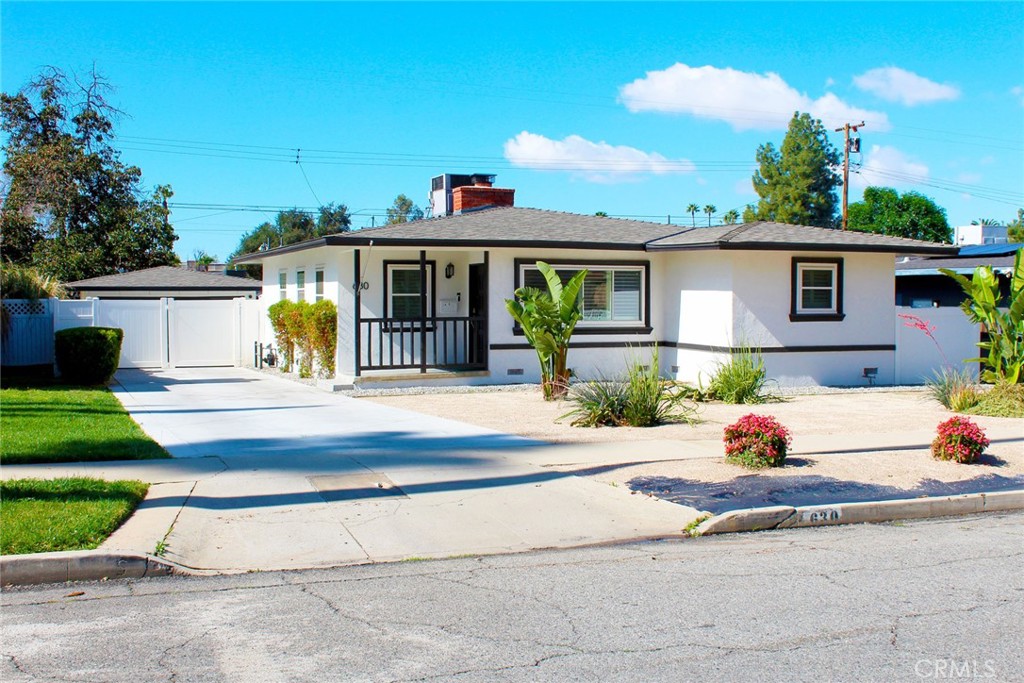 630 Roosevelt Road Redlands, CA 92374 - Photo 1 of 1 a house view with a garden space