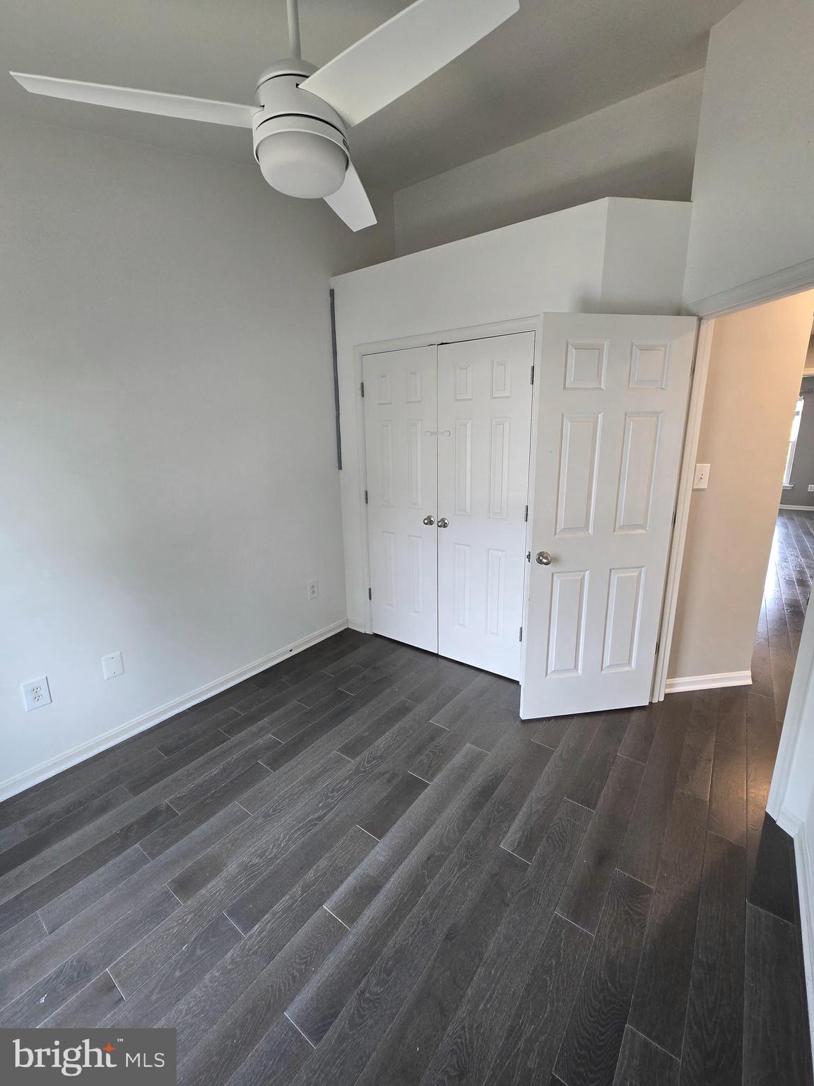 11847 Skylark Road Clarksburg, MD 20871 - Photo 21 of 46 a view of an empty room with wooden floor