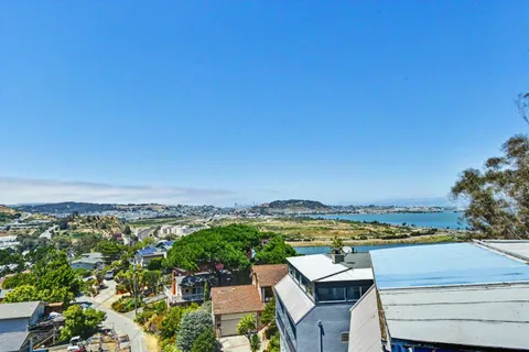 a view of a building from a city view