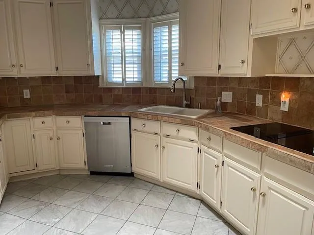 a view of a hallway with windows