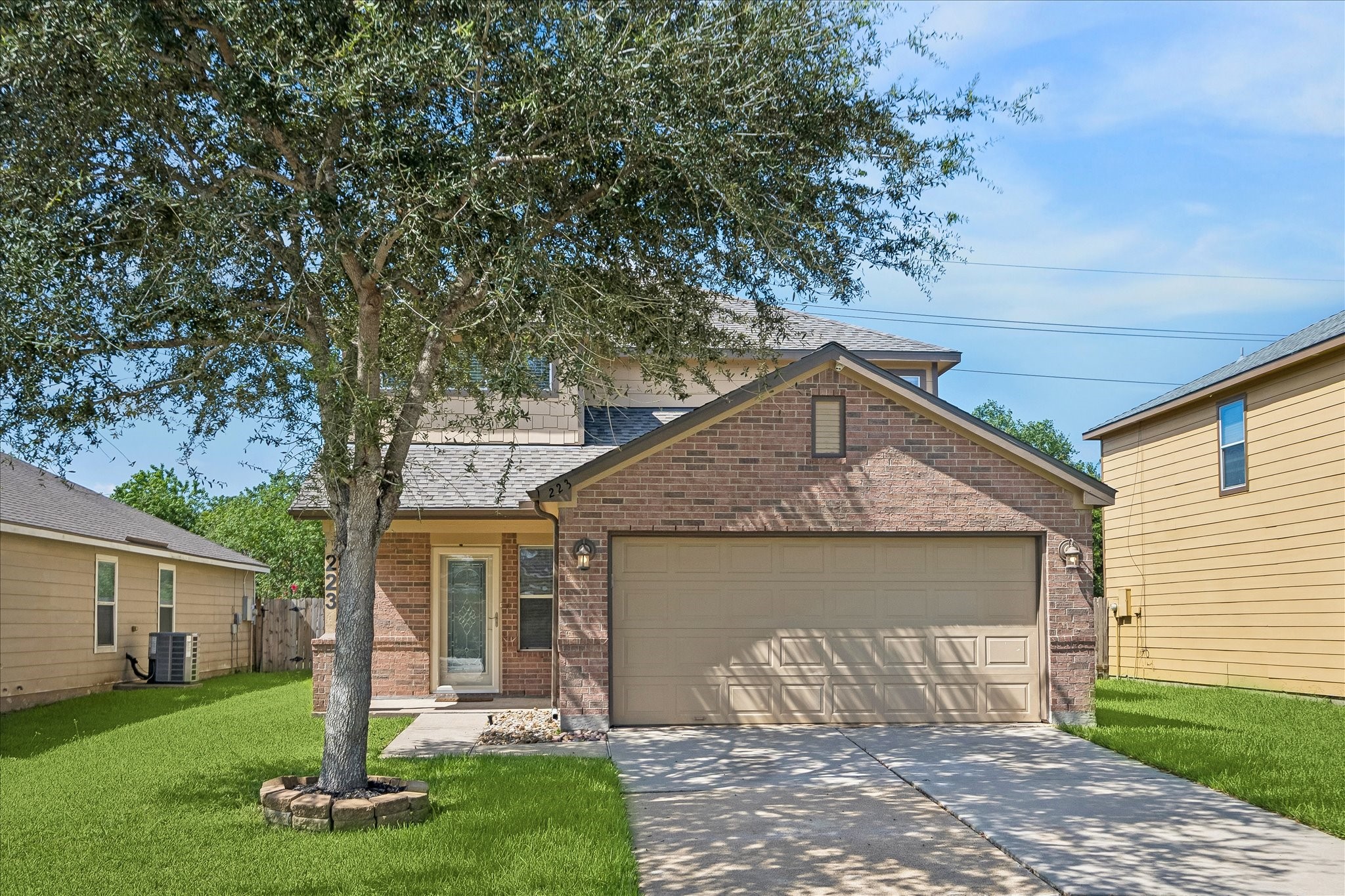 223 Sunset Colony Drive Rosharon, TX 77583 - Photo 49 of 50 With no rear neighbors, a spacious patio and a sprawling fenced yard, this backyard feels private and full of possibility, while the sprinkler system helps keep outdoor care easy.