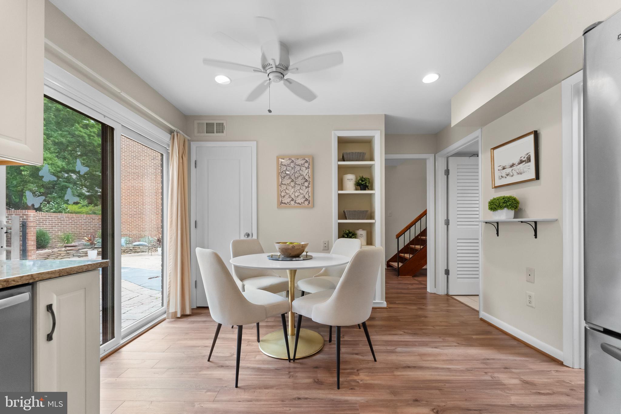 11303 Harborside Cluster Reston, VA 20191 - Photo 17 of 30 a view of a dining room with furniture window and wooden floor