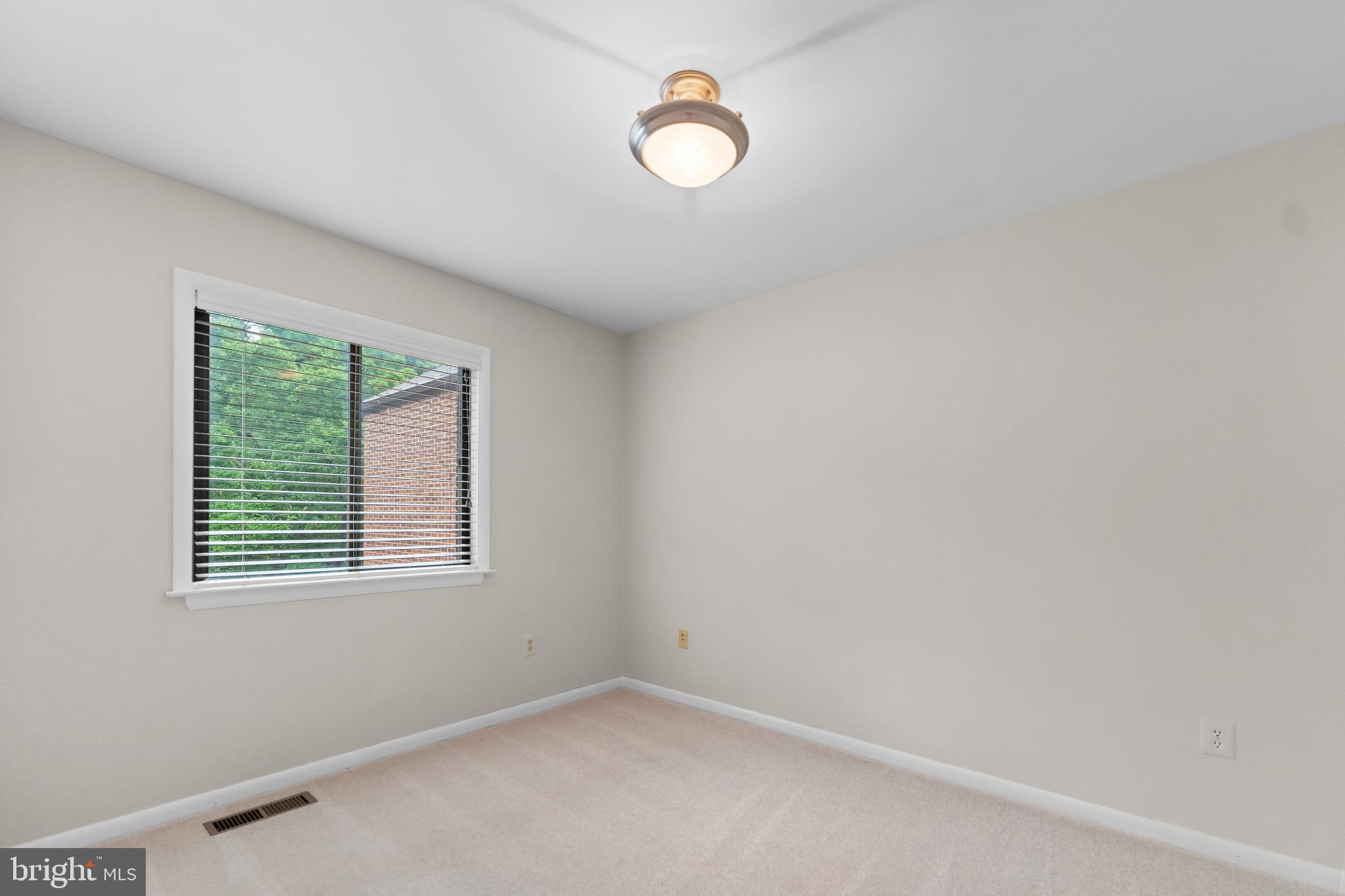 11303 Harborside Cluster Reston, VA 20191 - Photo 28 of 30 a view of empty room with window