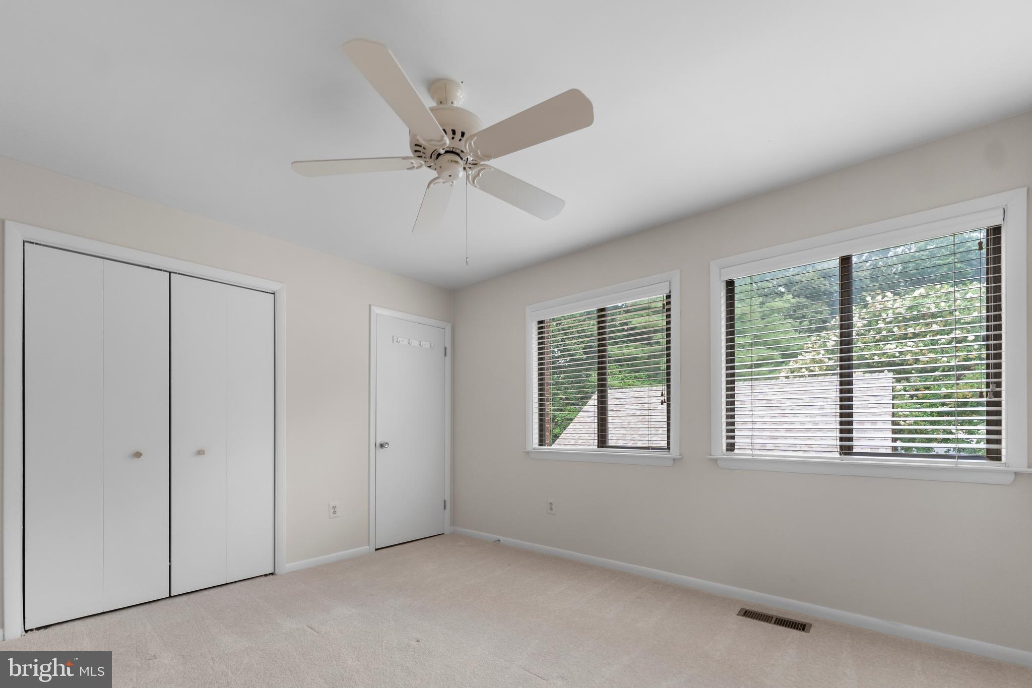 11303 Harborside Cluster Reston, VA 20191 - Photo 29 of 30 a view of an empty room with a window