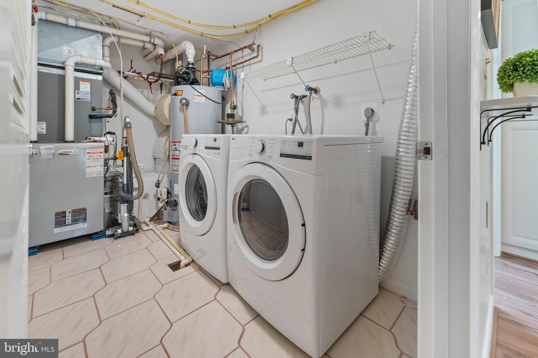 11303 Harborside Cluster Reston, VA 20191 - Photo 30 of 30 a utility room with dryer and washer