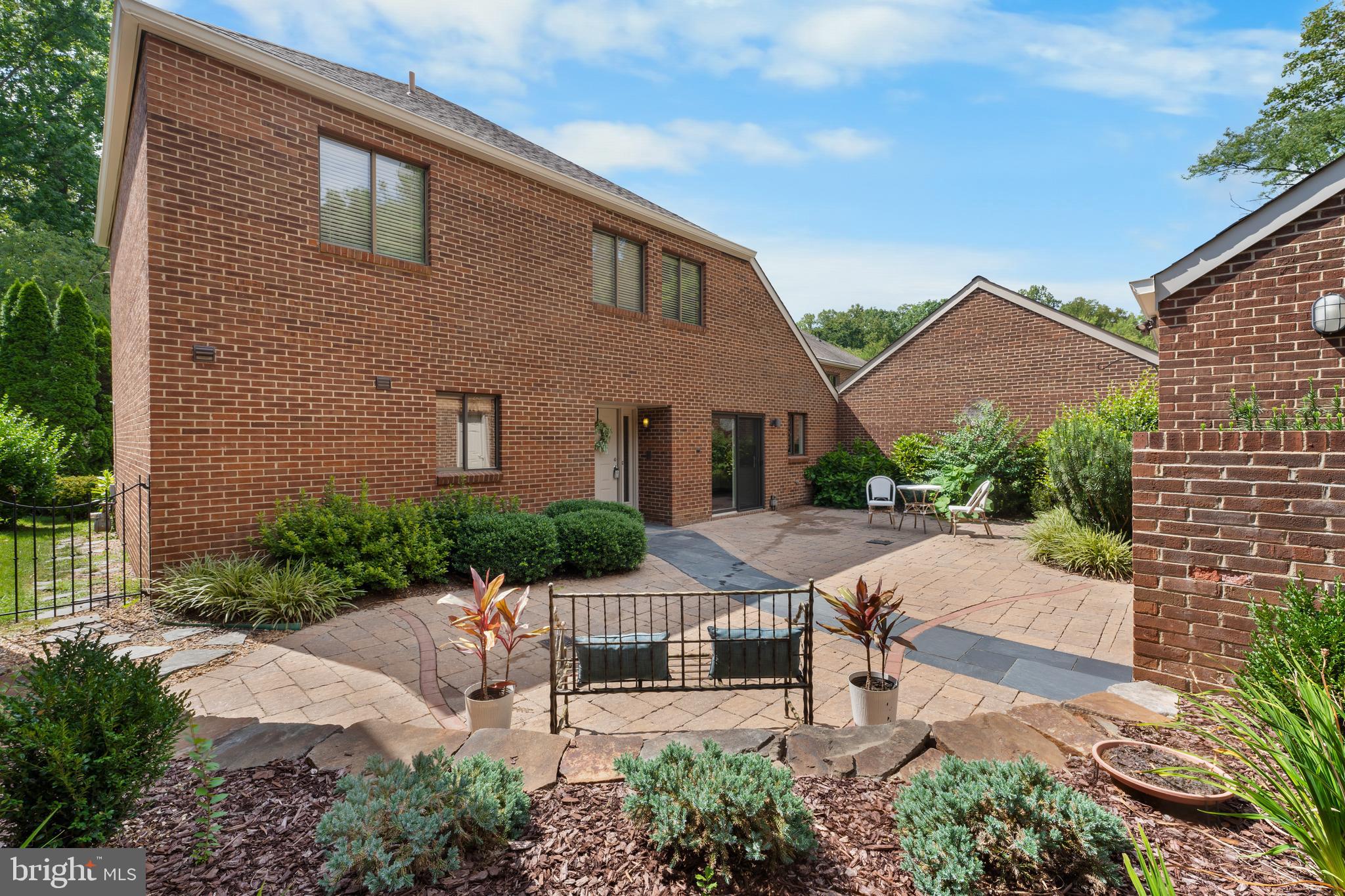 11303 Harborside Cluster Reston, VA 20191 - Photo 6 of 30 a front view of house with yard and green space