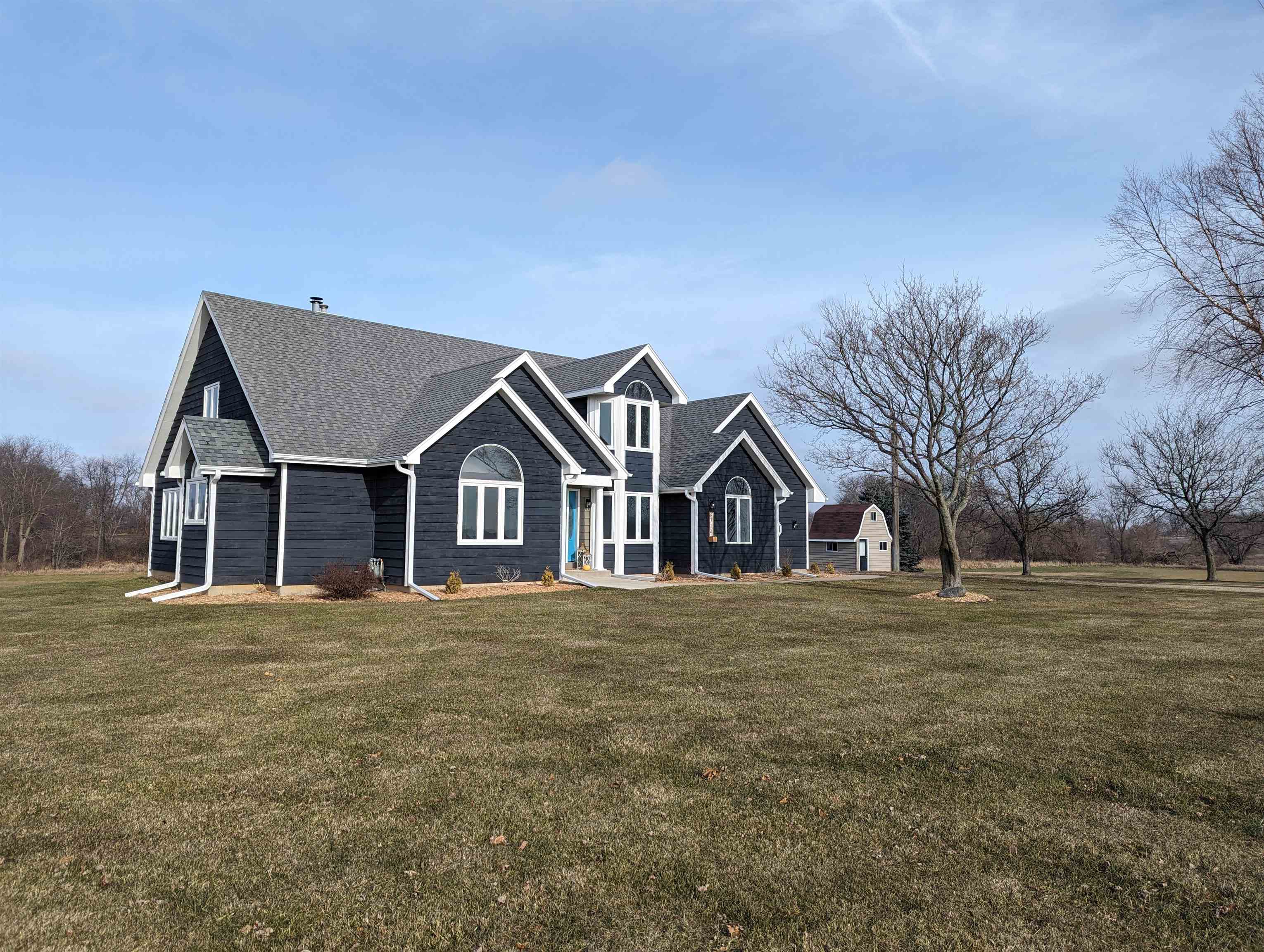 8712 East Kelley Road German Valley, IL 61039 - Photo 23 of 34 a front view of a house with a yard