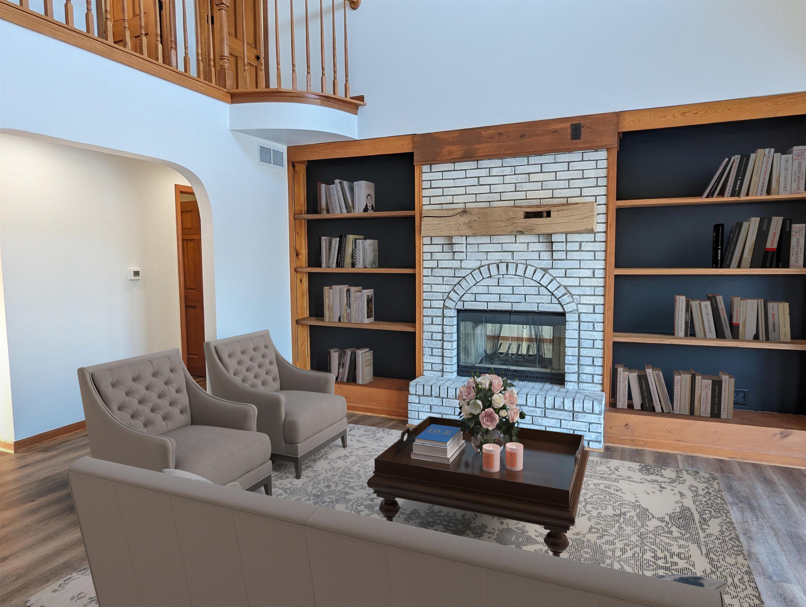 8712 East Kelley Road German Valley, IL 61039 - Photo 6 of 34 a living room with furniture and a fireplace