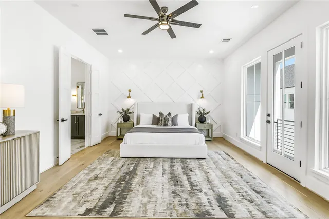 a view of a balcony with wooden floor and fence