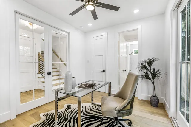 a bedroom with bed and window