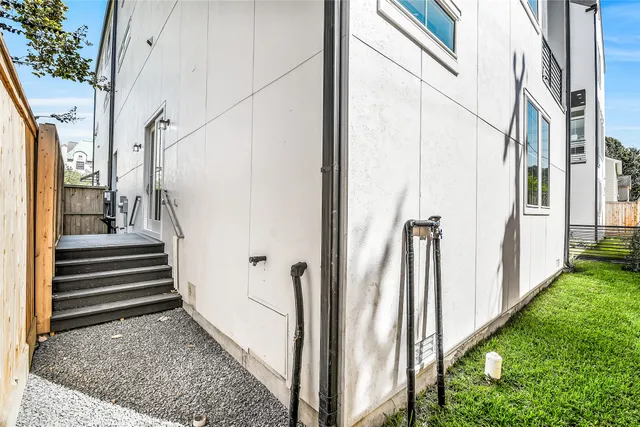 an aerial view of a house with a garden