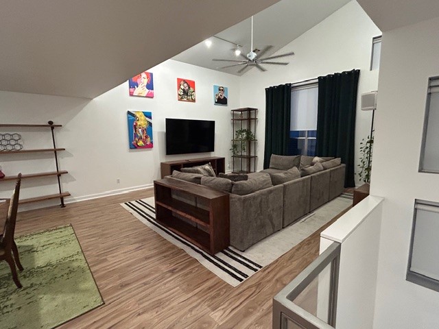 3010 Commerce Street Houston, TX 77003 - Photo 2 of 10 a living room with furniture and a flat screen tv