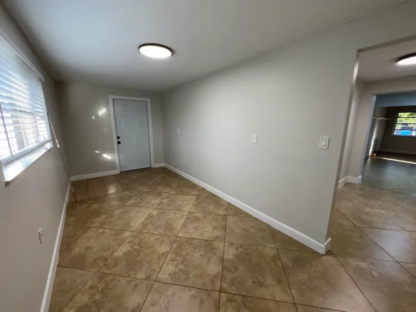 an empty room with a window