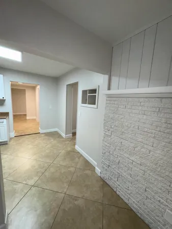a view of an empty room with a sink