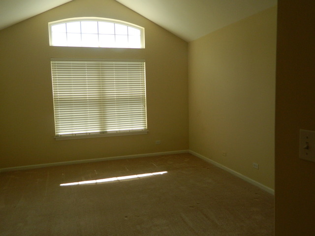 881 Brompton Court Carol Stream, IL 60188 - Photo 11 of 19 a view of empty room with a window