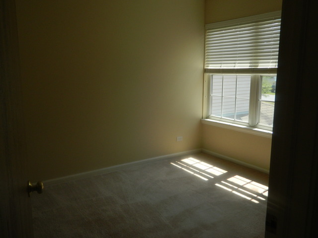 881 Brompton Court Carol Stream, IL 60188 - Photo 15 of 19 a view of an empty room with a window